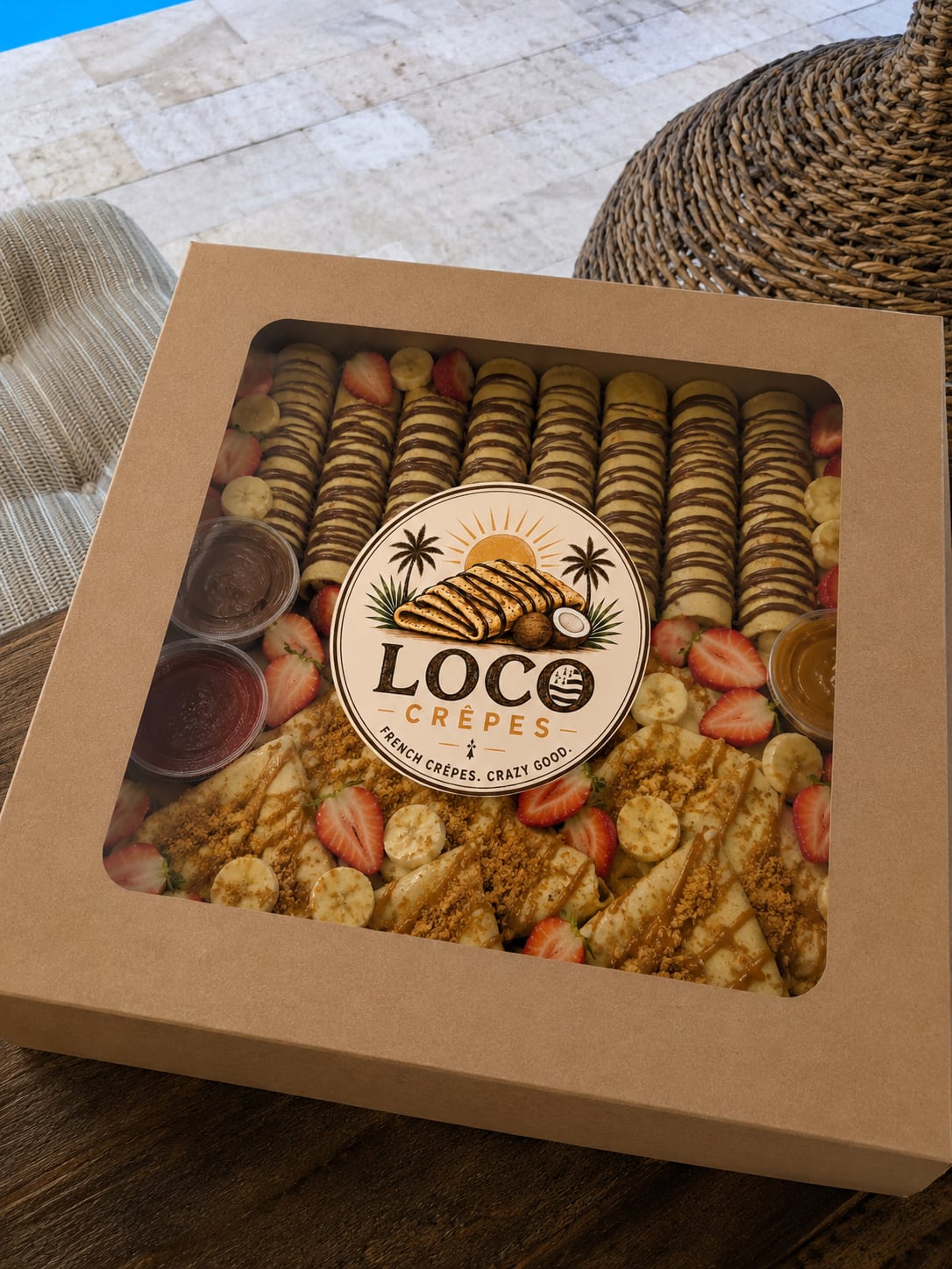 Branded LOCO Crêpes party box with chocolate, fruit, and caramel crêpes